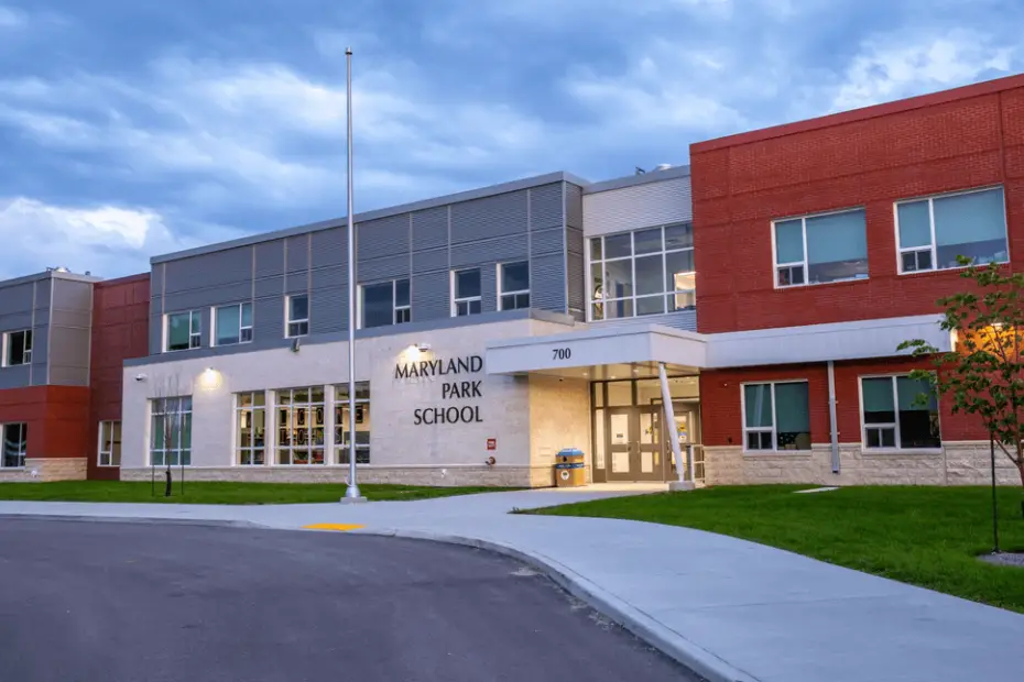 Maryland Park School exterior: A modern school building with large windows, showcasing the innovative design and energy efficiency of the facility.
